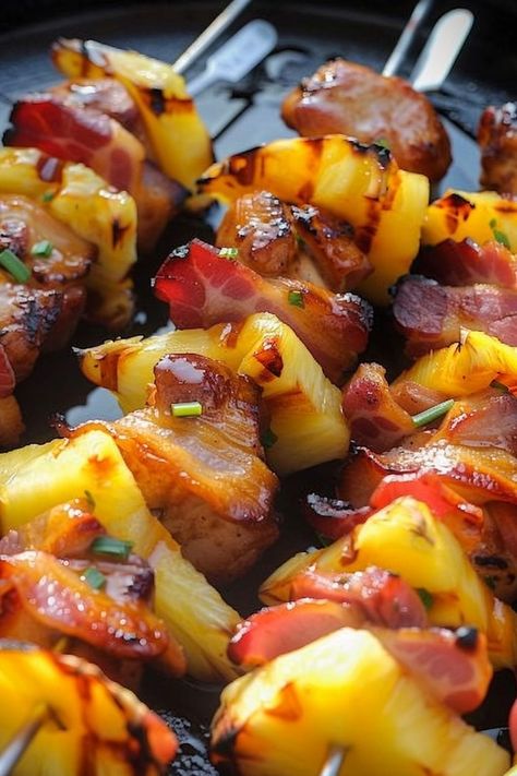 Bacon, Pineapple, Chicken Kabobs are a delightful blend of savory and sweet flavors, creating a mouthwatering dish that’s perfect for any grilling occasion. This recipe is a wonderful throwback to summer barbecues with family and friends, where the aroma of grilled meats and fresh pineapple … Smoked Chicken Kabobs, Chicken Pineapple Kabobs, Pineapple Chicken Kebabs, Bacon Pineapple, Pineapple Chicken Kabobs, Pineapple Kabobs, Kabob Sticks, Pineapple Skewer, Hawaiian Bbq