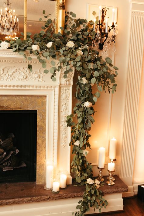 Silver dollar and mixed roses  #eucalyptus #fireplace #mantle #wedding Flowers For Fireplace Mantle, Eucalyptus Alter Decor, Eucalyptus Fireplace Mantle, Fireplace Mantle Decor Wedding, Fireplace Altar Wedding, Fireplace Wedding Flowers, Eucalyptus Mantle Decor, Eucalyptus Garland Mantle, Wedding Fireplace Mantle