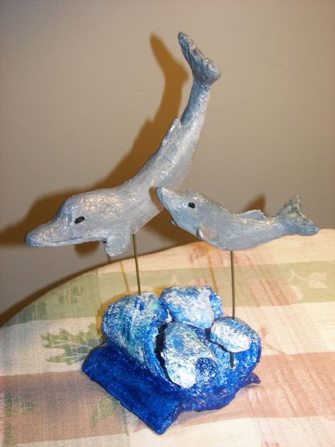 Paper mache Dolphins. The waves/base was made from toilet paper rolls Evolution Project, Toilet Paper Rolls, Paper Rolls, Toilet Paper Roll, Paper Mache, Toilet Paper, Dolphins, Evolution, Crafts For Kids