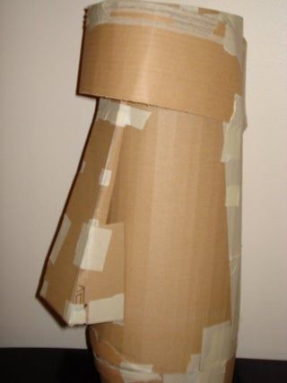 How to Make an Easter Island Head Costume : 7 Steps (with Pictures) - Instructables Wall Hanging Diy Paper, Easy Wall Decoration Ideas, Zoo Decor, Diy Paper Flower Wall, Easter Island Statues, Easter Island Heads, Paper Flower Wall Hanging, Tiki Statues, Tiki Decor