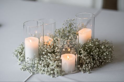 Baby’s breath and candle set provided by Okie Floral Co. Photo by @jagphotovideo in Tulsa, Ok. We are an Oklahoma-based floral design company. We love to travel though! Inquire today! Planning by XO EVENT CO. Simple Chic Centerpieces, Centrepieces With Candles And Flowers, Baby’s Breath Center Piece Simple, Low Centerpieces Wedding Round Table With Candles, Baby’s Breath Wedding Table Setting, Babies Breath Flower Arrangement, Wedding Baby Breath Centerpieces, Babys Breath Table Decoration, Candle And Baby Breath Centerpieces