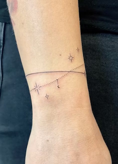 Stars Wrap Around Tattoo, Star Arm Band Tattoo, Forearm Star Tattoos For Women, Star Tattoo Sleeve Women, Fine Line Wrist Bracelet Tattoo, Falling Stars Tattoo, Star Bracelet Tattoo, Star Wrap Around Tattoo, Wrist Wrap Tattoos For Women