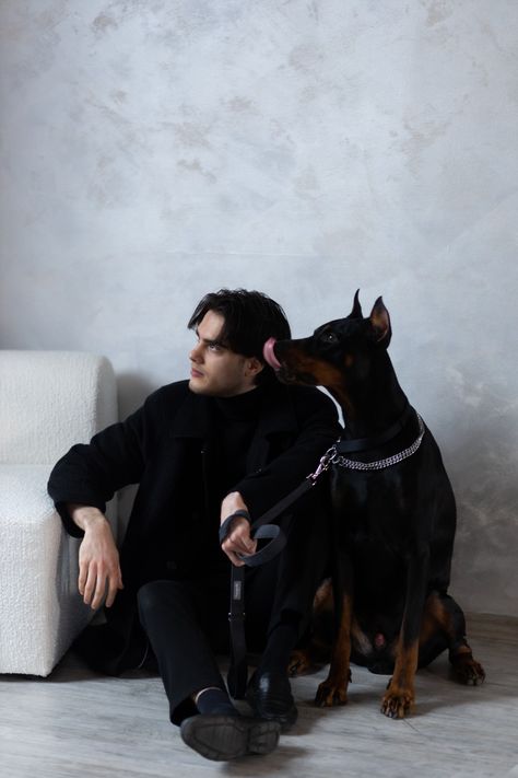 #malemodel #black #style #minimalism #dog #doberman #photoshoot Person Petting Dog Pose Reference, Doberman Aesthetic Rich, Megumi Reference, Doberman Outfits, Panther Photoshoot, Pet Owner Photography, Dog Owner Aesthetic, Doberman Model, Doberman Photoshoot