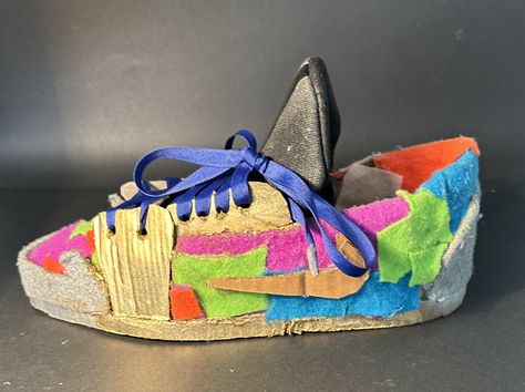 Preston, 4th piece in 3D Art. "Sneaker" Spring 2023. 7th Grade. Cardboard, fabric, spray paint. Preston enjoyed the meditative rewards of unrestricted sculpture and the problem solving that it gave. On this last piece, they decided to use cardboard and fabric to create a functional shoe. They brought in one of their old shoes, meticulously took it apart, studied the placements, and began recreating the shoe. A lot of trial and error and YouTube videos went into this art piece. Sporty Low-top Sneakers From Recycled Materials, Adidas Recycled Plastic Shoes, Casual Low-top Sneakers Made Of Recycled Polyester, Casual Lace-up Sneakers Made Of Recycled Rubber, Sports Recycled Polyester Low-top Sneakers, Teacher Gif, Fabric Spray Paint, Military Kids, Spring Sneakers