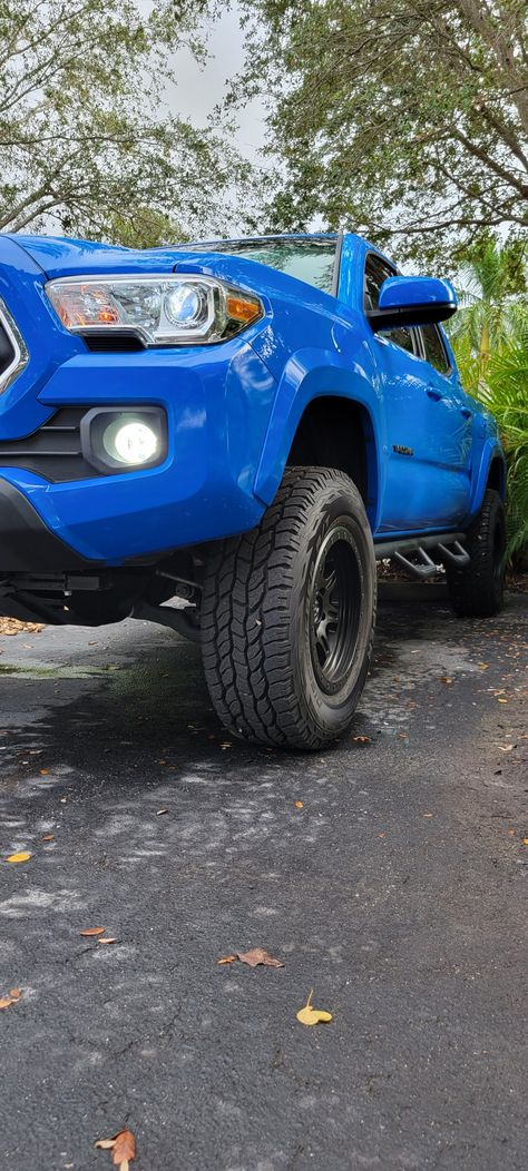 2020 SR5 Tacoma truck in Voodoo Blue. 3 x 2 inch leveling kit with 265/70/17 wheel upgrade. Fuel JM2 17 inch rims with Cooper Discoverer A/T tires. Blue Tacoma, Voodoo Blue, Tacoma Truck, 17 Wheels, Dream Garage, Future House, Bright Blue, Tires, Dream Cars