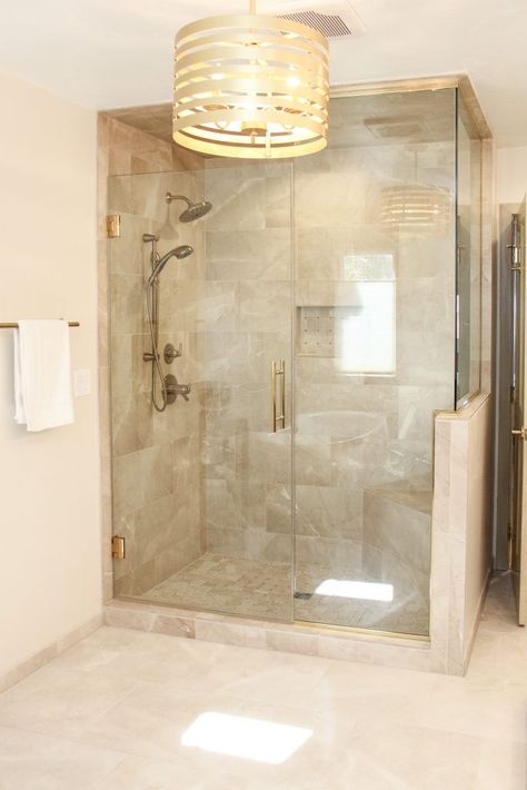 Beige Marble Tile Shower with Glass Shower Door and Gold Accents Marble Bathroom Beige, Shower Tile Ideas Beige, Tan Marble Bathroom, Shower Tile Beige, Tan Shower Tile, Tan And White Shower Tile, Beige Shower Tile Ideas, Master Shower Tile Beige, Beige Shower Tile