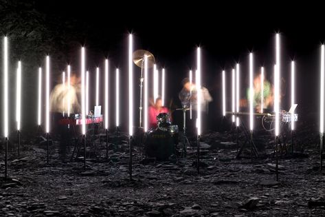 To create a music video for the band Battles, UVA positioned a triangular grid of vertical LED columns in a unused slate quarry in Wales. The designers knew they’d have at most a day to film the video, so they created a detailed simulation of the performance in their London studio beforehand. Conception Scénique, United Visual Artists, Led Installation, Street Theatre, Pixel Led, Everything Is Illuminated, Led Stick, Home Lighting Design, Led Band