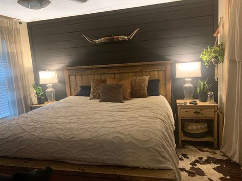 Black shiplap. Master bedroom. DIY king bed. DIY nightstands. Bedroom With Black Shiplap Wall, Western Bedroom With Accent Wall, Modern Farmhouse Nightstand Diy, Western Bedroom With Black Accent Wall, Black Shiplap Headboard, Western Room Accent Wall, Black Shiplap Bedroom Wall, Western Black Accent Wall, Dark Shiplap Wall Bedroom