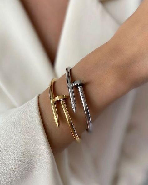 “Classy and timeless ✨ Our nail anti-tarnish bracelets are available in three stunning shades: golden, silver, and rose gold! Perfect for everyday wear, whether you’re heading to college or the office. Don’t miss out – grab yours now from our website! 💻 Link in bio! #DailyWearEssentials #ClassyAccessories #NailBracelet #GoldenSilverRoseGold #FashionStaple” Nail Bracelet, Us Nails, Website Link, Silver Rose Gold, The Office, Daily Wear, Link In Bio, Everyday Wear, Rose Gold