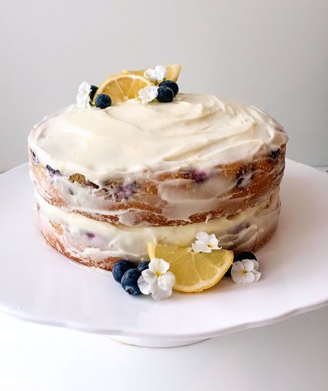 A lemon cake with blueberries and a lemon buttercream frosting #lemon #lemoncake #blueberry #lemonblueberrycake #cottagecore Lemon Blueberry Cake Aesthetic, Lemon Cake Aesthetic, Homemade Birthday Cake, Cottagecore Cake, Blueberry Lemon Cake Recipe, Fall Birthday Cakes, Lemon Buttercream Frosting, Beauty Cakes, Lemon Buttercream