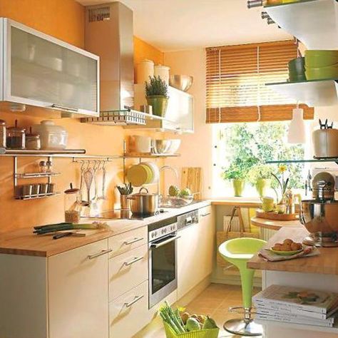 a sherbet orange accent wall with light butcher block countertops + white and stainless steel cabinets Orange Kitchen Walls, Orange Kitchen Designs, Orange Accent Walls, Orange Kitchen Decor, Best Kitchen Colors, Light Wood Kitchens, Kitchen Design Color, Kabinet Dapur, Kitchen Wall Colors