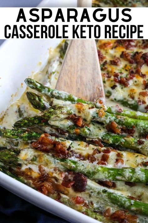 Asparagus casserole covered with cheese and bacon in a white pan with a wooden spatula. Cheesy Asparagus Casserole, Cheesy Asparagus, Asparagus Side, Kasey Trenum, Asparagus Casserole, Casserole Keto, Postre Keto, Baked Asparagus, Ham Soup