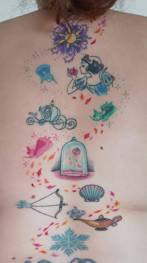 Princess Tattoo For Daughter, Disney Thigh Sleeve Tattoo, Disney Princess Symbols Tattoo, Feminine Disney Tattoo, Pretty Disney Tattoos, Disney Back Tattoos For Women, Disney Charm Tattoo, Disney Spine Tattoo, Disney Back Tattoo