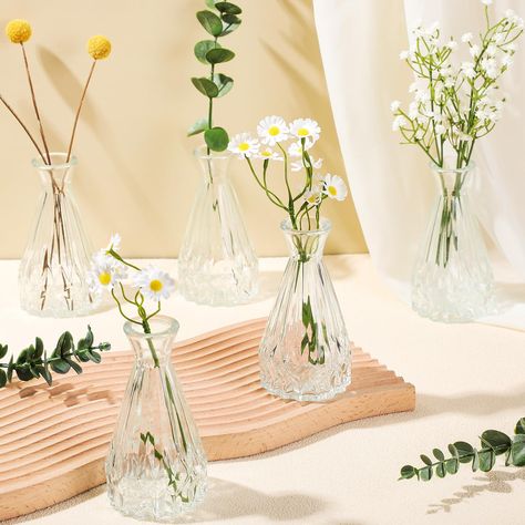 PRICES MAY VARY. Flower Vases Package Including: you will receive 12 pack small clear flower vases, the diameter of the small vase is about 2.76 inches/ 7 cm and the height is about 5.19 inches/ 13 cm; Using this set of flower vases bulk as an excellent choice for decorating the center decoration can add a simple and elegant charm Quality Glass Vases for Centerpieces: the clear bud vases are made of high quality glass with conical lotus design, thick and sturdy, lustrous and textured, easy to cl Mini Vases With Flowers Table, Clear Bud Vases, Simple Centerpieces For Party, Bud Vases Arrangements, Wedding Anniversary Party Decorations, Glass Vases Centerpieces, Glass Bud Vases, Lotus Bud, Single Flowers