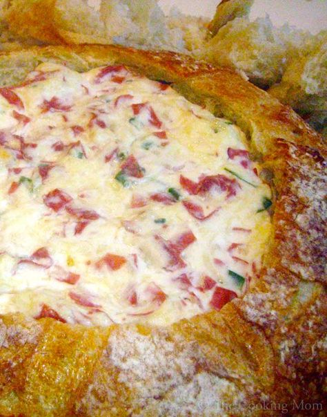 Ingredients: 1 large round loaf sourdough or rye bread 1 cup mayonnaise 2 blocks (8 ounces each) cream cheese, softened 1 cup sour cream 1/2 pound corned beef, chopped A few dashes hot sauce 2 cups shredded Swiss cheese 1 1/2 cups sauerkraut, drained well 4 to 5 scallions, chopped, divided Extra sliced rye bread … Appetizers Tailgate, Chipped Beef Dip, Cobb Loaf, Bread Bowl Dip, Baby Shower Appetizers, Superbowl Recipes, Reuben Dip, Shower Appetizers, Beef Dip