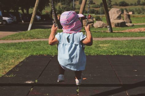 These Are The Best Materials To Put Under A Swing Set | OwnPlayground What To Put Under Swingset, Playground Swings, Wood Mulch, Rubber Mulch, Backyard Swings, Rubber Tiles, Pea Gravel, Foam Mats, Rubber Mat