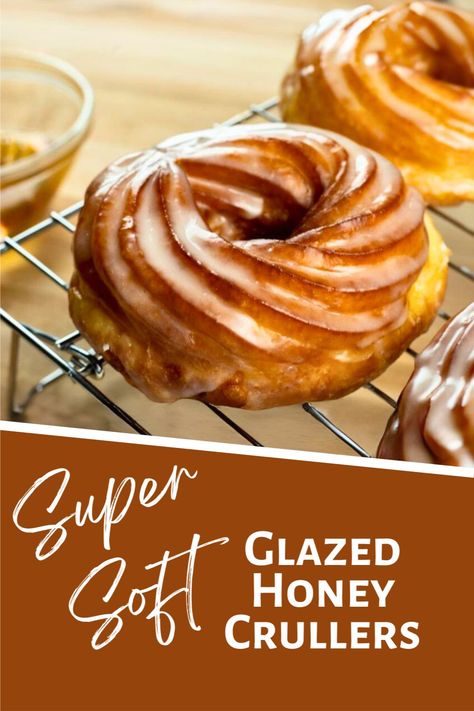 Indulge in the sweet symphony of Glazed Honey Crullers. These golden treats are a delightful blend of airy choux pastry and a luscious honey glaze. Discover how to create these heavenly donuts with our step-by-step recipe. Pin now and treat yourself to a bite of bliss! #HoneyCrullers #HomemadeDonuts #SweetTreats #RecipeOfTheDay #BakingMagic #HoneyCrullers #DonutDelights #SweetBaking #GoldenGoodness #BakersOfPinterest #DessertTime #EasyRecipe #HoneyGlaze Honey Cruller Recipe, Honey Butter Glaze For Rolls, Honey Crueller, Tiger Tail Donuts Recipe, Honey Glazed Donut, Cruller Donut Recipe, Crullers Recipe, Cruller Donuts, Donut Filling