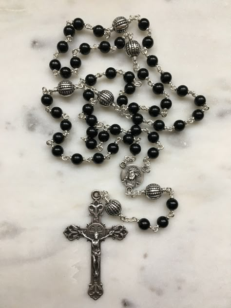 Wonderful wire-wrapped onyx gemstone rosary made from 6mm onyx beads and 10mm sterling silver Bali "Our Father" beads. The rosary is put together with heavy duty 20 gauge sterling silver wire and chain. The crucifix and center are sterling silver reproduction medals. The Rosary is the most excellent form of prayer and the most efficacious means of attaining eternal life. It is the remedy for all our evils, the root of all our blessings. There is no more excellent way of praying.~Pope Leo XIII Priest Oc, Nose Cuffs, Black Rosary, Pope Leo Xiii, Pope Leo, Silver Rosary, Goth Jewelry, Our Father, The Rosary