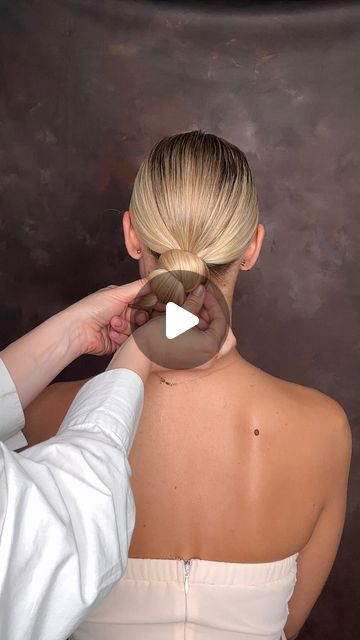 Kasia Fortuna on Instagram: "🌟 Ready to master this chic low bun? 
Watch this step-by-step mini tutorial:
Start by smoothing the hair for a flawless base.
Choose your go-to product: smoothing cream, mousse, or hairspray. I opt for Moroccanoil luminous hairspray for a glossy finish.
As you twist the ponytail, apply a hint of mousse or cream for added shine and control.
Shape the bun with U pins, ensuring precision.
Secure it with grips for stability, and hide any visible pins.
Seal the deal with an elastic band, tucking away the ends.
You’ve totally got this! 💁‍♀️
Ready to explore more sleek styles? Join our vibrant Online Academy for bridal hairstylists! Tap the link in our BIO.

💇‍♀️ @kristinagasperasacademy @moroccanoilpro @moroccanoileu #MOprofessional #BTCxMOpartner #thebtcteam @beh Chic Low Bun, Low Bun Tutorial, Low Bun Tutorials, Sleek Low Bun, Flawless Base, The Bun, Mini Tutorial, Online Academy, Sleek Bun