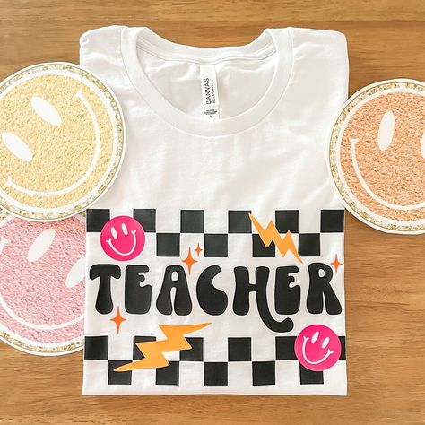 Excited to share this item from my #etsy shop: Teacher Checkered Tee, Adult Unisex Bella Canvas T-Shirt, White, Short Sleeve Shirt, Trendy Top, Retro, Gift, Teacher Mode, Back to School Teaching Hacks, Teacher Canvas, Teacher Fits, Cute Teacher Outfits, Teacher Clothes, School Spirit Shirts, Teaching Outfits, White Short Sleeve Shirt, Cricut Craft