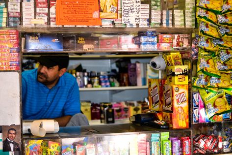 Connecting at the Counter - Urban Omnibus Bodega Cat, Dutch Masters, Small Corner, Human Poses, American Cities, Global Economy, Losing A Pet, Store Fronts, Scales