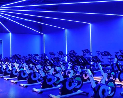 Inside: Gym Lighting Design - Prolight Design Strip Light Ideas, Inside Gym, Fitness Advertising, Cycling Studio, Gym Lighting, Small Home Gym, Spin Studio, Gym Interior, Cycling Design