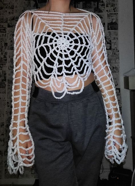 Meticulously handmade crochet spider web top, featuring captivating bell style sleeves. This unique piece is perfect for spooky season. For a personalized touch such as short, long, or bell sleeves, as shown in the photos or different colors feel free to message me. Crochet Spider Costume, Crochet Spider Web Sleeves, Spider Web Shirt Crochet, Crochet Spider Web Shrug, Crochet Spider Web Dress, Crochet Holey Sweater, Crochet Spider Web Gloves, Crochet Top Bell Sleeve, Spider Web Clothing