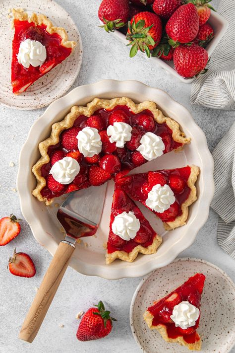 A fresh strawberry pie in a flaky pastry crust garnished with piped-on dollops of vanilla whipped cream. Strawberry Pie Photography, Strawberry Pie Aesthetic, Strawberry Cream Pie, Strawberry Pop Tart, Scandinavian Wedding, Strawberry Pie Recipe, Fresh Strawberry Pie, Strawberry Glaze, Strawberry Tart