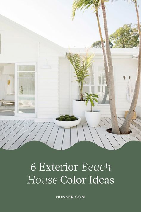 Among home exterior ideas, there are few as fun to fantasize about as exterior beach house colors like turquoise, bright white, and pink. #hunkerhome #beachhouse #beachhouseideas #beachhousedecor White Beach House Exterior, Exterior Beach House Colors, Beach House Exterior Paint Colors, Coastal Exterior House Colors, Coastal Beach House Exterior, House Color Ideas, Coastal Homes Exteriors, Beach Bungalow Exterior, Beach House Exterior Colors