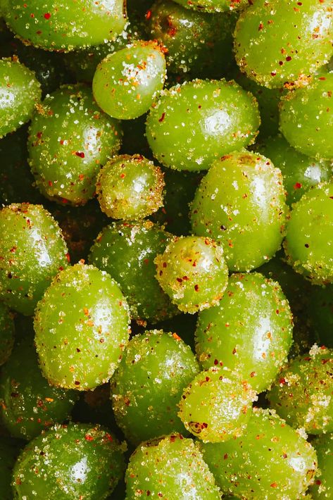 Introducing my latest snack obsession. My Frozen Tajin Grapes are a sweet and tangy snack that is perfect for the warmer months! Plus, this recipe uses only four simple ingredients, and comes together in the freezer in just a few hours, making it the perfect, pre-ahead snack to keep you cool, all summer long!A close-up image of the frozen Tajin grapes Frozen Grapes With Tajin, Snack Ideas For Get Togethers, Grapes With Tajin, Frozen Fruits Aesthetic, Fun Snack Ideas For Adults, Frozen Tajin Grapes, Tajin Gummy Bears Recipe, Snacks With Grapes, Fruit Based Meals