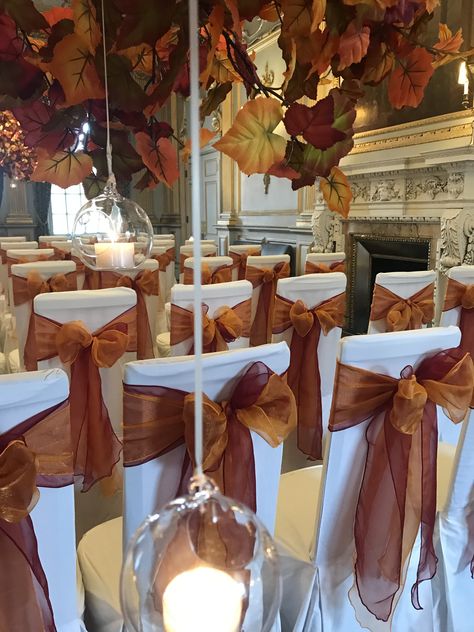 Burnt Orange Chair Sashes, Chocolate Brown And Burnt Orange Wedding, Chair Dressing Wedding, Auburn Wedding Theme, Burnt Orange And Beige Wedding, Autumnal Wedding Decor, Autumn Wedding Reception Ideas, October Wedding Table Decor, Burnt Orange Chair