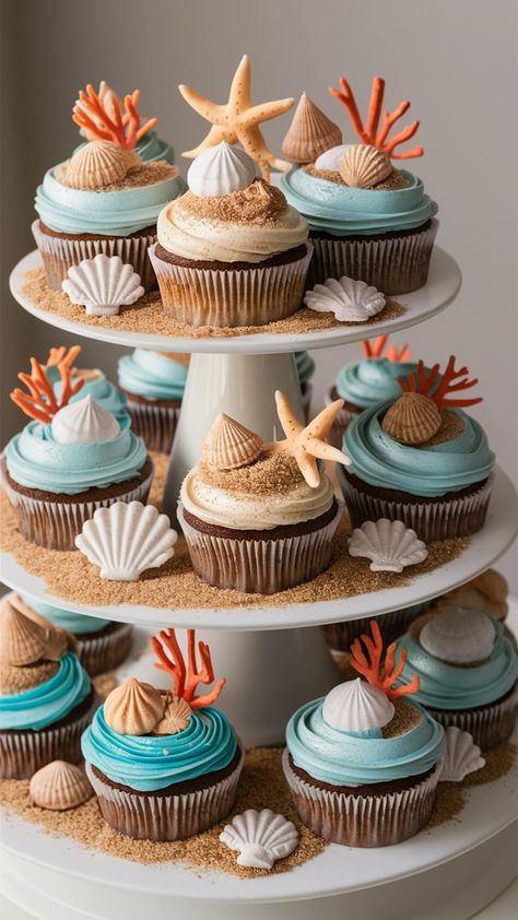 Coastal-Inspired Beach-Themed Cupcakes: Perfect Summer Treats Ocean Themed Dessert Table, Food For Beach Wedding, Blue Cupcake Recipes, Jelly Fish Cupcakes, Yacht Rock Party Food, The Summer I Turned 16 Party, Beach Themed Birthday Party Ideas, Palm Tree Cupcakes, Sea Themed Desserts