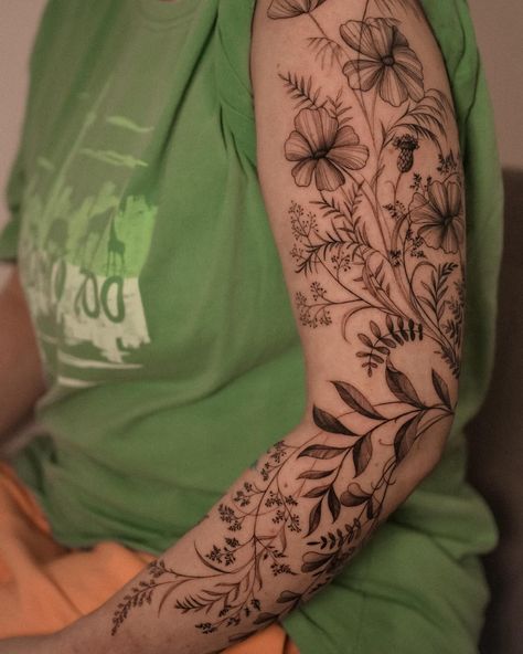 🌿✨ Taking a closer look at the intricate details of this floral sleeve tattoo, drawn entirely in free-hand technique 🌱🌱🌱 #floraltattoo#branchtattoo#sleevetattoo#plantstattoo#flowertattoo#tinytattoo#finelinetoronto#finelinetattoo#tattootoronto Flower Garden Sleeve Tattoo, Wildflower Arm Sleeve, Mixed Flower Tattoo Half Sleeves, Wildflower Arm Wrap Tattoo, Filler Floral Tattoo, Sleeve Background Tattoo, Floral Sleeve Filler, Floral Sleeve Tattoo Men, Patchwork Floral Sleeve Tattoo