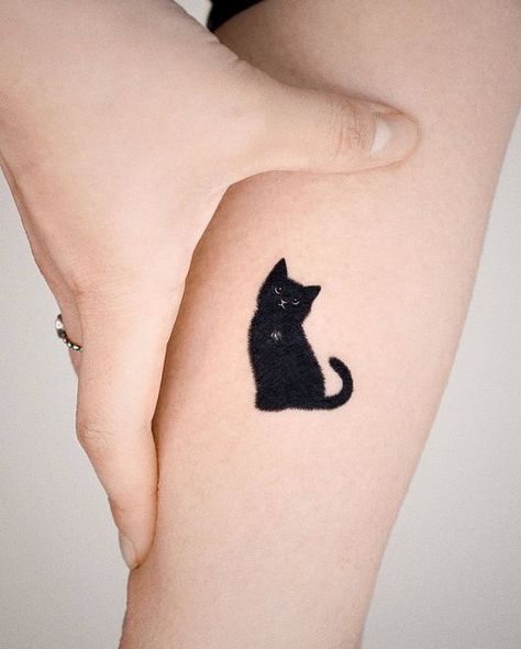 Black Cat Tattoo. Black Cat And Books Tattoo, Small Black Cat Tattoo Simple, Tortishell Cat Tattoos, Tattoos For Women Cat, Small Cat Tattoo, Cat And Dog Tattoo, Black Cat Tattoo, Cat Tattoo Design, Kitten Tattoo