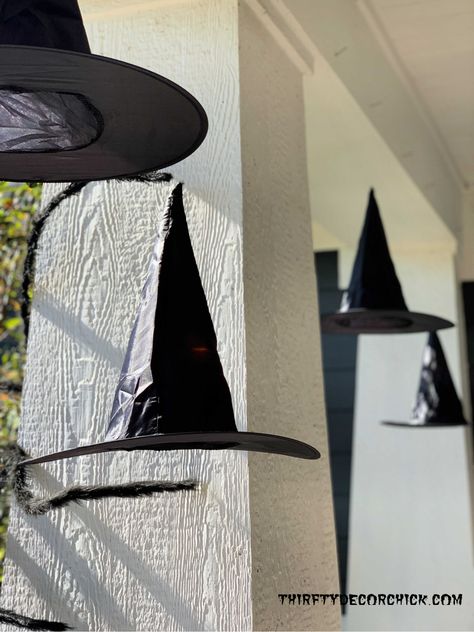 Hanging Witch Hats Porch, Halloween Decor Inside, Cheesecloth Ghost Diy, Floating Witch Hats, Mummy Candles, Floating Witch, Porch Beams, Hanging Witch, Black Witch Hat