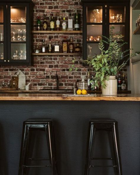 ELYSE MCCURDY | HOME DESIGNS on Instagram: "Continuing on with the topic of basements: pictured here is our bar setup. We might have a modest square footage above grade but we sure make up for each square footage below grade too! As I have mentioned before, square footage is a personal topic - we see these ginormous homes on social media and for most that just isn’t our reality. While I love looking and dreaming -- (even designing them for others!) but when it came to designing and building my Home Bar Renovation Ideas, Home Bar Small Space, Basement Bar Back Wall, Basement Moody Bar, Basement Home Bar Ideas, Moody Bars, All Black Basement, Bar With Brick Wall, Dark Moody Basement Ideas