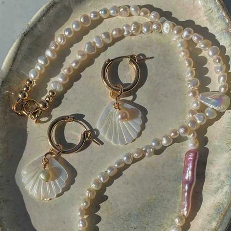 ✨🐚Seashells scattered along the shore, each a memory of the tide, mother of pearl glimmers softly, reflecting whispers of the sea, a treasure of quiet beauty 🌊✨ Spotlight on the Lola Mother of Pearl Hoops. These flirty hoops shimmer in the sun's rays and flutter in a beautiful motion. Available in Ocean-safe, Shower-safe 14k gold filled premium metal or Sterling silver. Both perfect for sensitive skin. From the Ocean Opulence Collection Explore @angelawozniakjewellery . . . #goldhoopea... Coastal Grandmother Aesthetic Jewelry, Coastal Grandmother Aesthetic, Grandmother Aesthetic, Quiet Beauty, Coastal Grandmother, Aesthetic Jewelry, The Ocean, Mother Of Pearl, Sea Shells