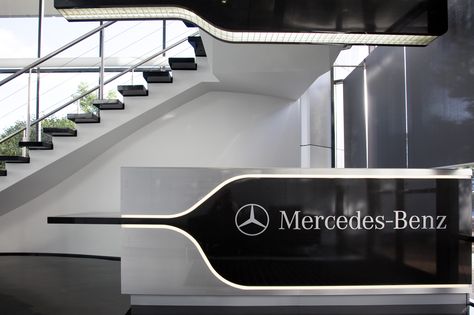 Mercedes-Benz Office Design Diy, Reception Counter Design, Office Reception Design, Modern Reception Desk, Reception Desk Design, Lobby Reception, Reception Counter, Corporate Interiors, Stall Designs