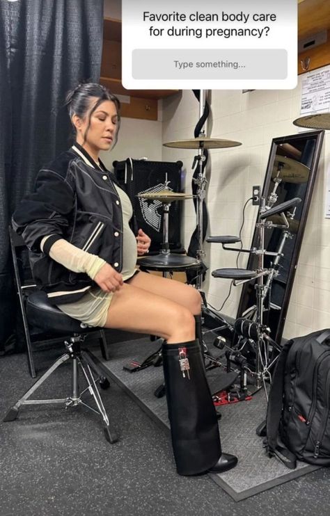 KOURTNEY Kardashian has shown off her baby bump in a never-before-seen photo after announcing her pregnancy. The 43-year-old mom-to-be lashed her growing stomach while wearing a sheer dress and oversized bomber jacket. Kourtney proudly displayed her figure while sitting in front of an electric drum set. She shared the snap on her Instagram Story on […] Kourtney Pregnant, Kourtney Kardashian Baby, Kourtney Kardashian Pregnant, Kourtney Kardashian Barker, Body Care Product, Kourtney Kardashian Instagram, Electric Drum Set, Kardashian Show, Celebrity Maternity Style