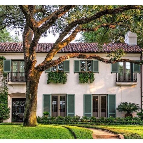 Tamra Lea Design on Instagram: “I love Spanish Colonial style architecture. This Houston, Texas home has so much to love, the beautiful green shutters, the courtyard…” Old Spanish Style Homes, Clay Tile Roof, Mediterranean Homes Exterior, Spanish Revival Home, Green Shutters, Tile Roof, Mediterranean Architecture, Home Exterior Makeover, Spanish Style Home