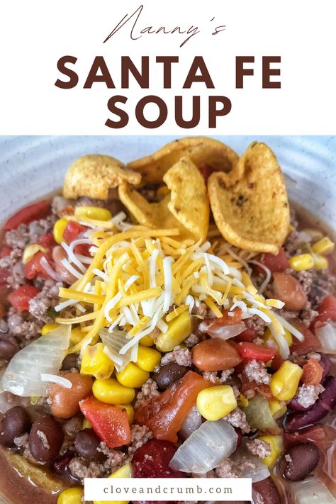 A spin off of the classic taco soup, Nanny’s Santa Fe Soup is full of beans, onion, tomatoes, corn, ground beef, and FLAVOR. Topped with Frito’s and shredded cheese, I’ve loved this soup since I was a kid. Enjoy! Santa Fe Stew Crock Pot, Sante Fe Soup Crock Pots, Santa Fe Soup Crockpot, Sante Fe Soup Recipes, Santa Fe Soup Recipe, Taco Soup Recipe No Beans, Taco Soup No Beans Crock Pot, Sante Fe Soup, Six Sisters Taco Soup