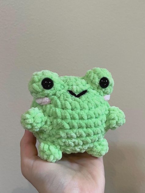 These frog plushes are hand crocheted by me with love! They are perfect for gifts, or if you want a little frog friend for yourself.   To find other colors and variations of this plush, look for my other frog plush listings on my site. Please message me with any questions or for custom orders. -Each frog is hand crocheted, stuffed, and sewn by me, so yours may vary from the listing photo, meaning each one is unique! -This item contains small parts that may come apart with rough handling, and may not be suitable for children under 3 years of age Fun Crochet Animals, Crochet Froggy, Unique Crochet Amigurumi, Stuff Animal Crochet Patterns, Cute Crochet Frog, Crochet Projects Plushies, Crochet A Frog, Crochet Stuff Toy, Crocheted Frog