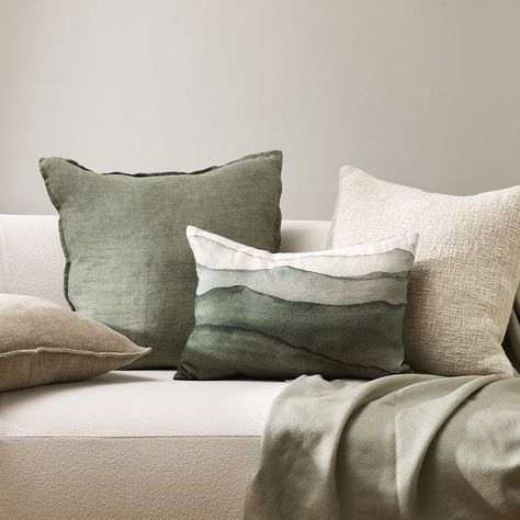 Invite the landscape inside with the evocative hand-painted design of Aurelia. Topographical forms are captured in a serene colour palette that creates a sense of calm and promotes wellbeing. Pair with neutral, sage, and winter moss tones.  #cushion #throwpillow #bedding #interiorstyling #interiordesign #livingroom #homestyling #architecture #australianhomes #handpainted Gable House, Plain Cushions, Gift Card Design, Outdoor Chair Cushions, Living Room Collections, Home Decor Vases, Rectangular Rugs, Bedroom Collection, Linen Cushion