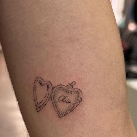 Sam’s Tattoos on Instagram: "a couple of lil locket tattoos" Tattoos For Little Sister, Tattoos For My Sister, Tattoo For Daughters Ideas, Tattoo For Little Sister, Boyfriend Tattoos For Women, Matching Girl Tattoos, Matching Kitty Tattoos, Little Sister Tattoo Ideas, Tattoo For Girlfriend