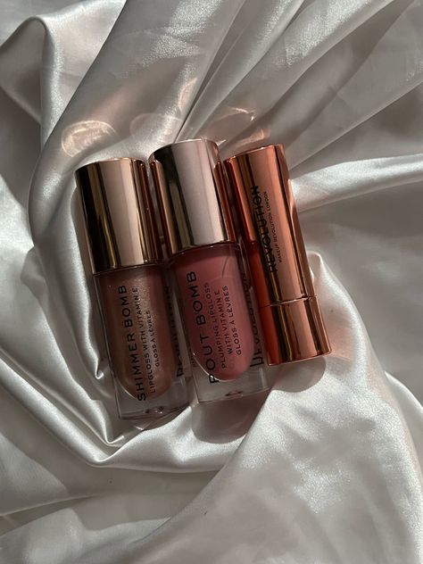 Revolution lip gloss and lipstick Makeup Revolution Lip Gloss, Revolution Makeup, Cosmetic Packaging Design, Preppy Shoes, Swag Makeup, Cheap Makeup, Skincare Aesthetic, Fancy Makeup, Cosmetic Packaging