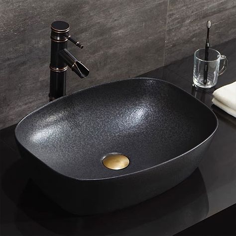 Bring some stylishness to your already chic bathroom with this black vessel sink. Dark Sink Bathroom, Black Vessel Sink Bathroom, Black Vessel Sink, Round Nesting Coffee Table, Stairs Bathroom, Black Bathroom Sink, Simple Dining Chairs, Round Nesting Coffee Tables, Vessel Sink Vanity