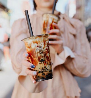 Boba Flavors, Brown Sugar Milk Tea, Brown Sugar Milk, Coffee Advertising, Coffee Shop Branding, Tea Places, Tea Cup Design, Bubble Tea Shop, Boba Drink