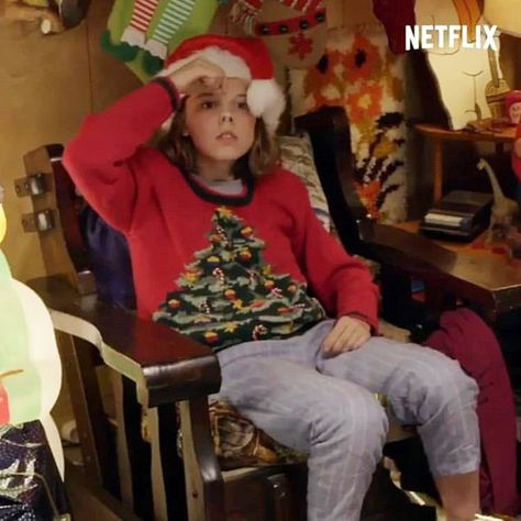 Stranger Things Christmas Video Screen Capture, Millie Bobby Brown Pulling Up Nose with Tape, Eleven, Season 3 Eleven Season 3, Stranger Things Christmas, Himouto Umaru Chan, Christmas Video, Xmas Pictures, Duffer Brothers, Disneyland Pictures, Bobby Brown Stranger Things, Casting Pics