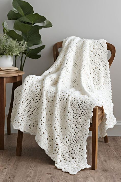 Elegant Evelyn crochet blanket showcasing a classic crochet blanket design, perfect for easy beginner crochet afghan projects using a single color pattern. Flecks Yarn Crochet Patterns, Crochet Blanket One Color, White Crochet Blanket Pattern, Beginner Crochet Afghan, Afgan Crochet, White Crochet Blanket, Easy Crochet Blanket Patterns, Blanket Decor, Velvet Throw Blanket