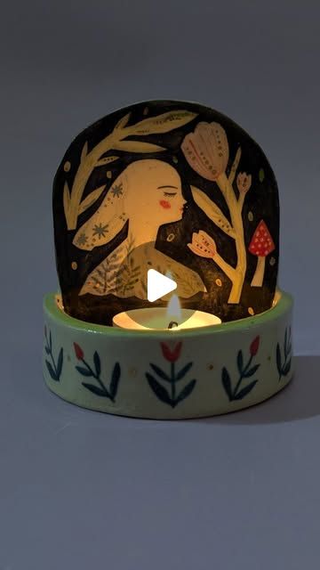 Layla Holzer ✸ Illustrator on Instagram: "Grey stormy weather 👉🏻 lighting every candle in the house

One of my little ceramic candle shrines, lit up and giving some cosy vibes ❤️✨

I hope you're all staying warm and dry today!
.
.
.
.
.
.
.
.
.
#stormbert #ceramicbeginner #ceramiccandleholder #candleshrine #candleholders #handsandheart #handsandhustle #MakersMovement #amacoglazes #ceramicpainting #illustratedceramics" Candle Shrine, Cosy Vibes, Amaco Glazes, Light Clay, Ceramic Candle Holders, Stormy Weather, Ceramic Candle, Illustrators On Instagram, Ceramic Painting